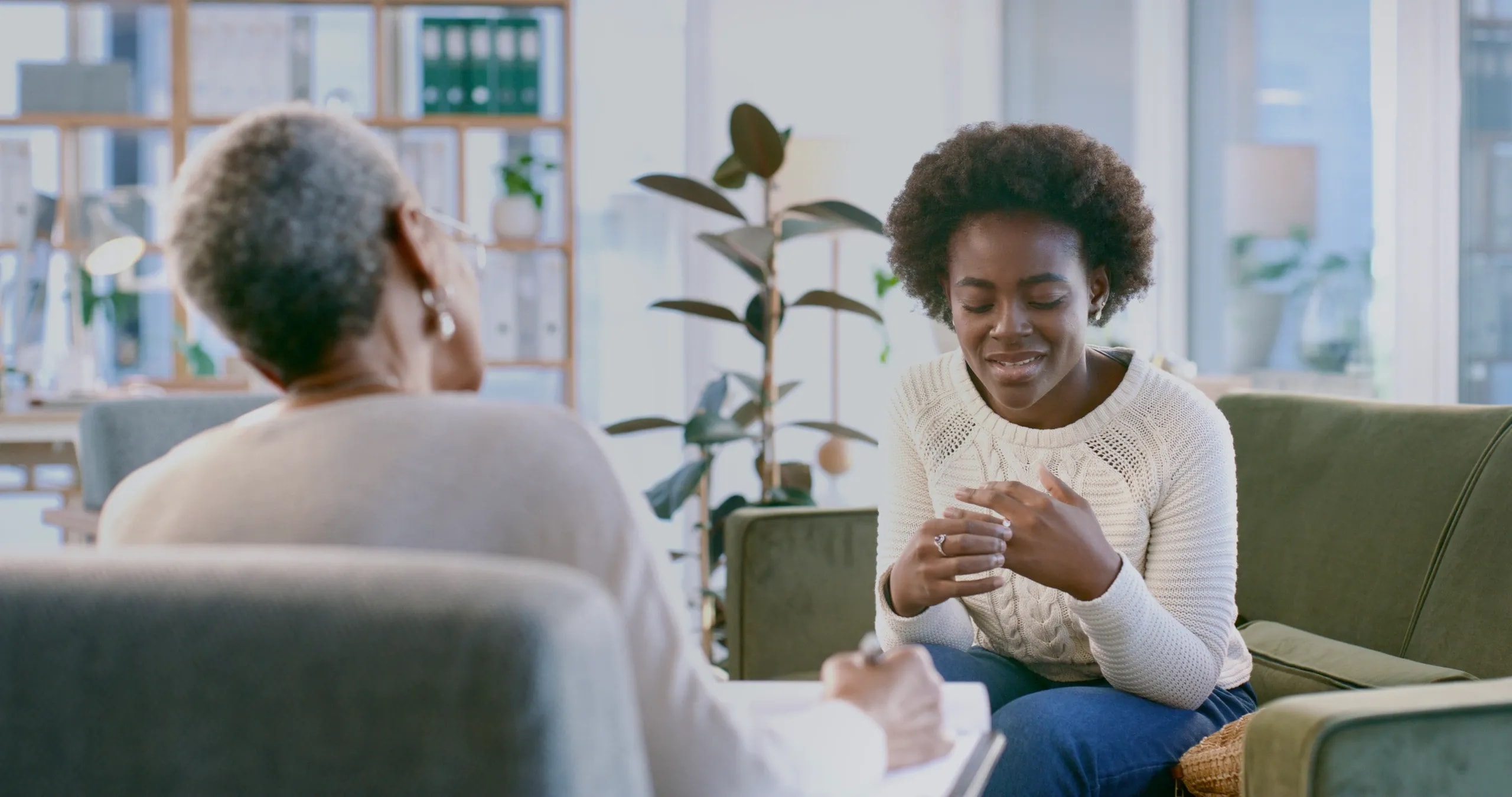 Compassionate therapist in a counseling session with a patient